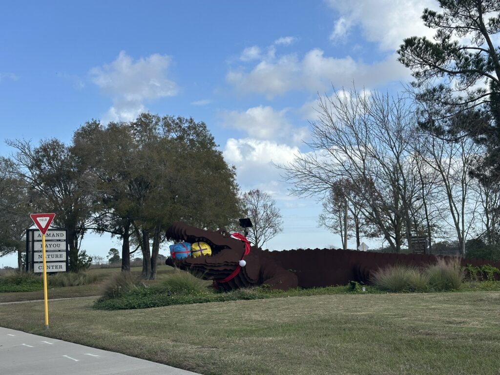 ARMANDO, 2024, A 50โ long, Core Ten steel, alligator at the entrance to Armand Bayou Nature Center, Pasadena, TX